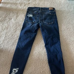 dark blue ripped skinny jeans